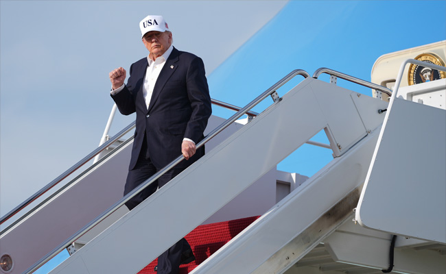 Trump returns from China; terms meeting with Xi as 'G-2'